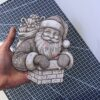 1 Santa Peaking Out Of The Chimney